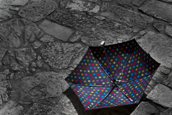 Abandoned umbrella on a sunny day — Stock Photo, Image
