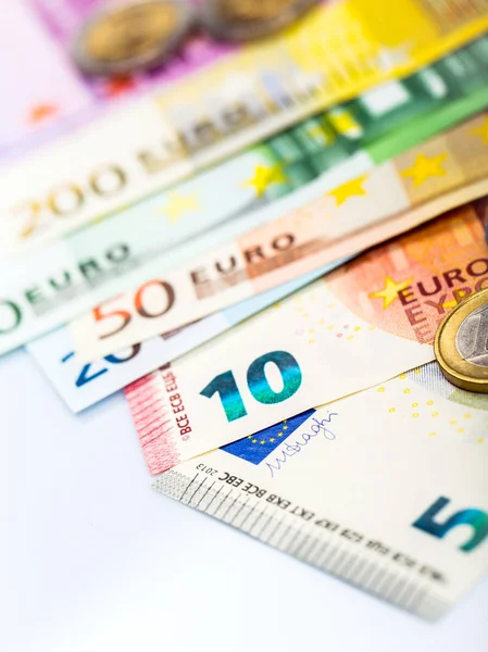 Closeup of banknotes and coins — Stock Photo, Image