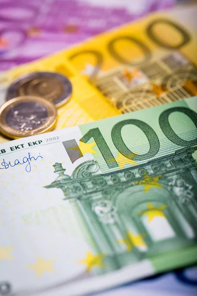 Closeup of banknotes and coins — Stock Photo, Image