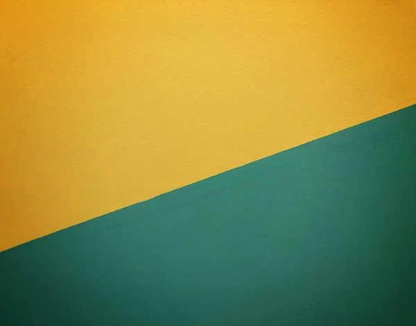 ビネット効果のある黄色と緑のコンクリートの壁 — ストック写真