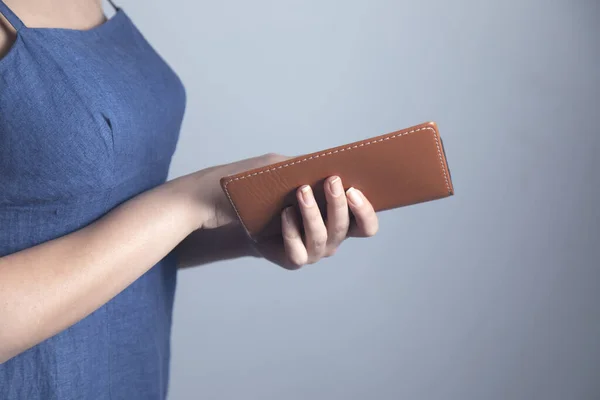 Woman Hand Holding Notepad Grey Background — Stock Photo, Image