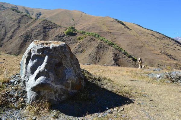 stone faces in the mountains of Georgia