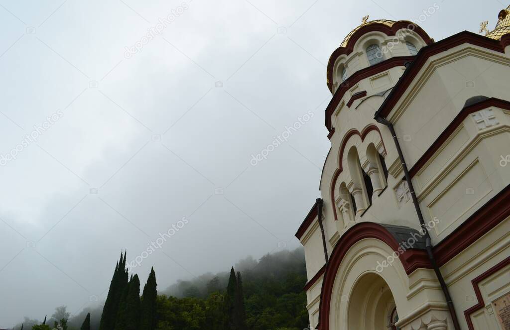 Church in the fog on a cloudy day. Abkhazia. new afon