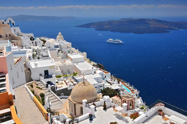 Afternoon view over town and ocean at Fira Thira Santorini Island Greece. Stock Photo