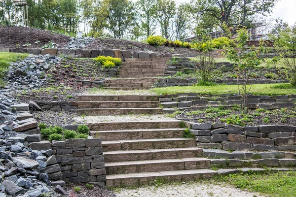 wide stone stairs in the rock garden park