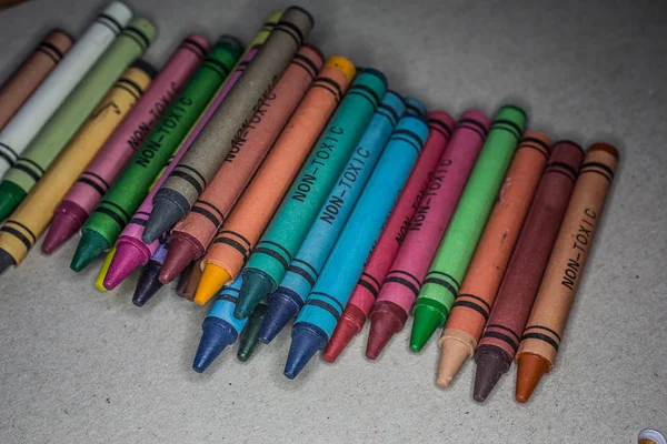 Colored pencils of different colors in containers — Stock Photo, Image