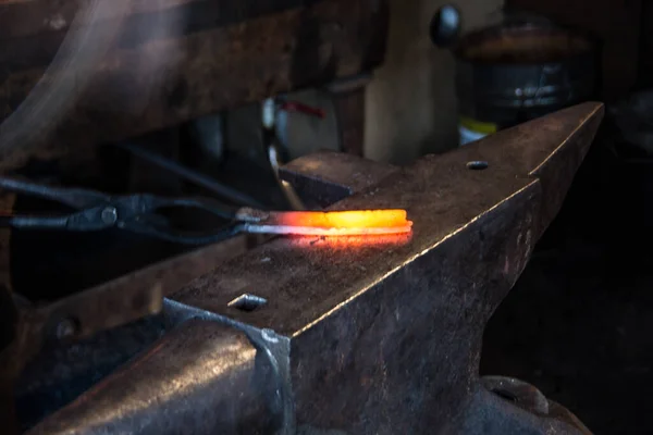 Coal fire and red-hot steel in the smithy