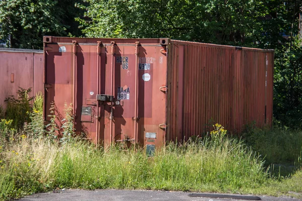 Red Brown Steel Container Grass — Stock Photo, Image