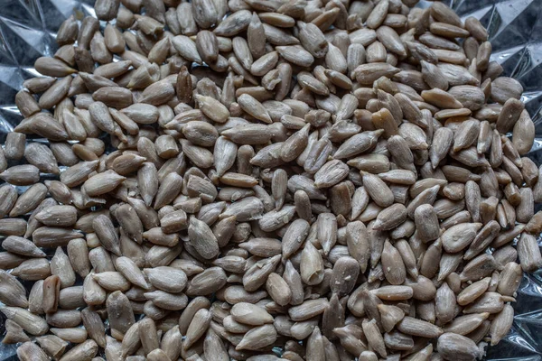 A pile of sunflower seeds as bird feed