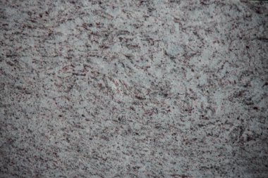 Arkaplan olarak parlaklaştırılmış granit taneleri