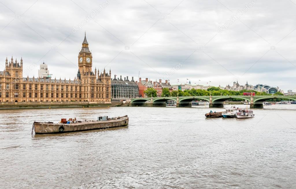 London - view of Thames river, Big Ben clock tower, Houses of Parliament.