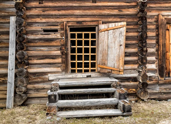 Door and ladder of rustic wooden house — Stock Photo, Image