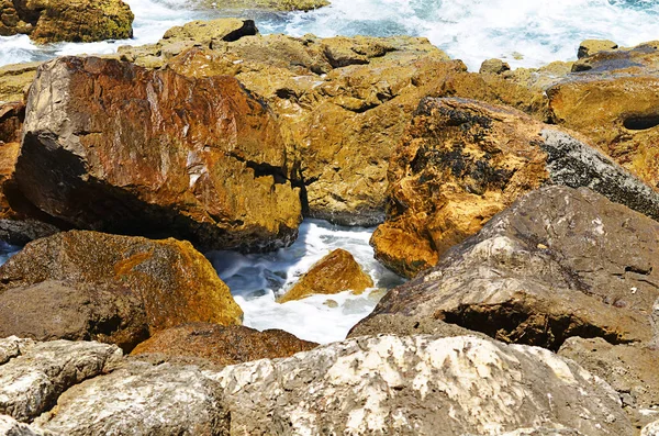 Detail textury pozadí kamenné moře — Stock fotografie
