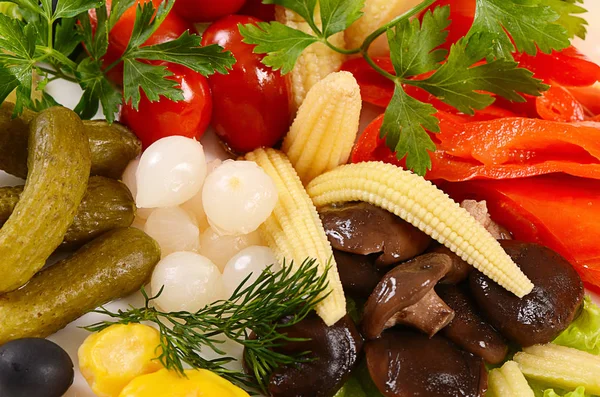 Assorted marinated vegetables and mushrooms — Stock Photo, Image