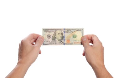 Beyaz arka plan üzerinde izole adam elinde dolar