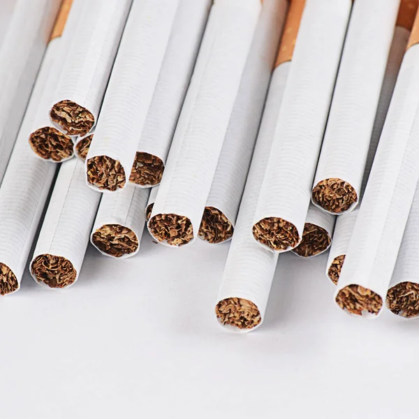 Tobak cigaretter bakgrund eller konsistens — Stockfoto