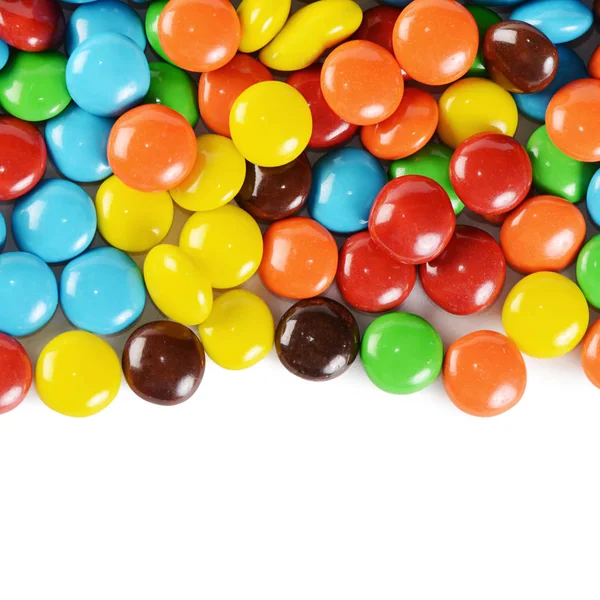 Primer plano de la pila de caramelos de chocolate de colores — Foto de Stock