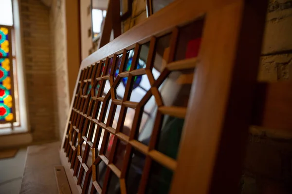 Photo of artisans workshop in Sheki, Azerbaijan. Shabaka Azerbaijan traditional stained glass technique using wood without nails and glue