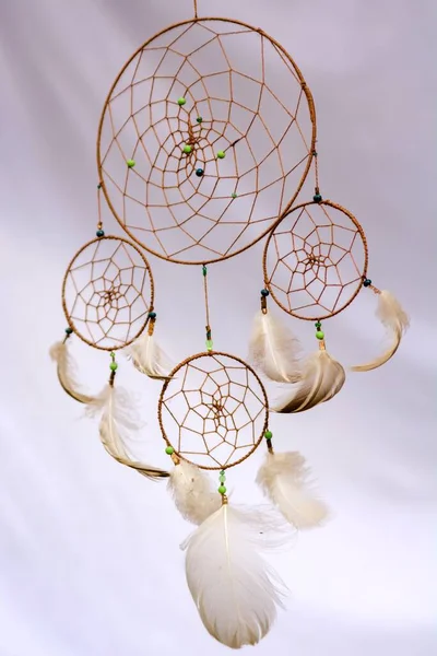 Indian dream catcher, three circles, beads and plumage