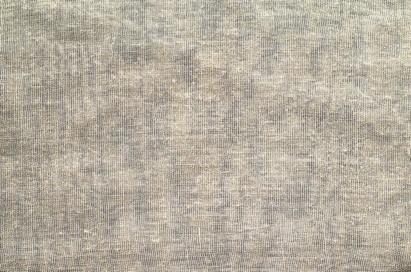 ベージュ色の大きな織り目の緩い生地の質感 — ストック写真