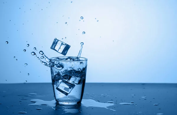 Glass Water Splash Ice Trendy Classic Blue Background Stock Picture
