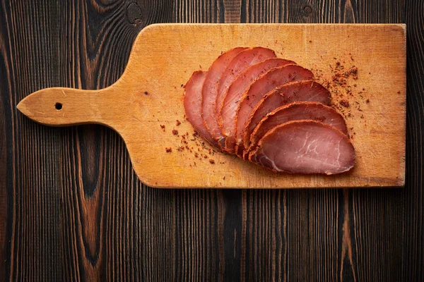 Dried pork meat sliced top view — Stock Photo, Image
