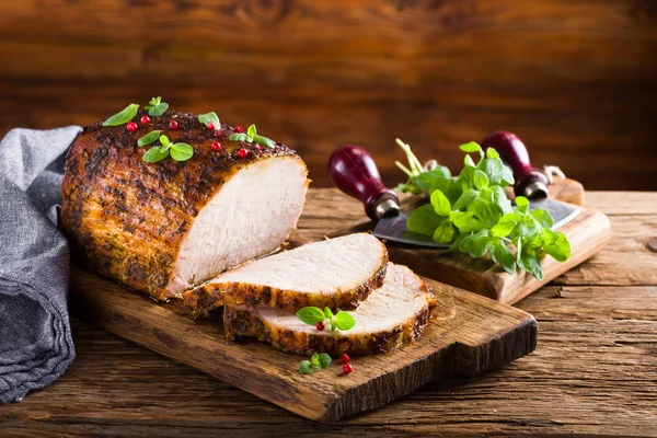 Roasted pork loin with garlic and marjoram — Stock Photo, Image
