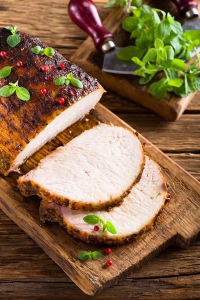 Roasted pork loin with cranberry and marjoram — Stock Photo, Image