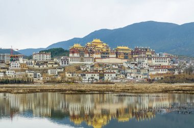 Songzanlin Temple is the largest Tibetan Buddhism monastery in Yunnan Province.It is called the Little Potala Palace or Ganden Sumtseling Monastery. clipart