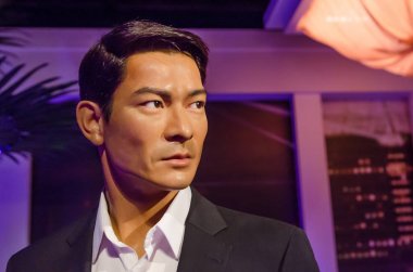The wax figure of Andy Lau in Madame Tussauds Singapore. Andy Lau is a Hong Kong actor, singer and film producer.  clipart