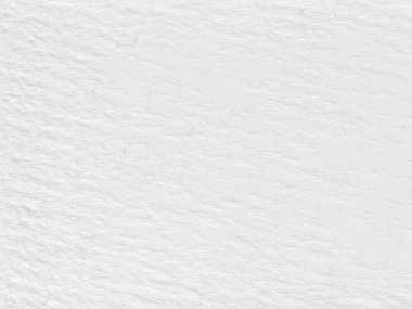 Beyaz, temiz bir arka plan. Yeni yüzey pürüzlü görünüyor. Duvar kağıdı şeklinde. Arkaplan dokusu duvarı ve metin için kopyalama alanı.