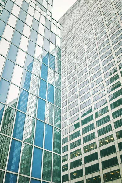 Color toned close up photo of skyscrapers. — Stock Photo, Image