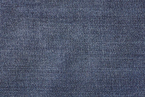 Закрыть синие джинсы ткань фона или текстуры — стоковое фото