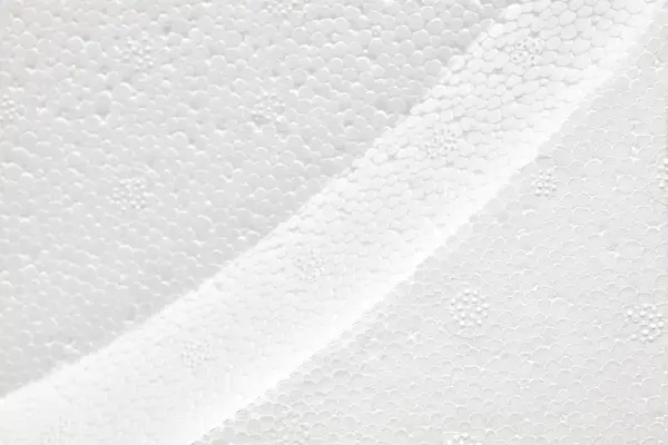 Espuma de poliestireno branco em forma, foco seletivo . — Fotografia de Stock