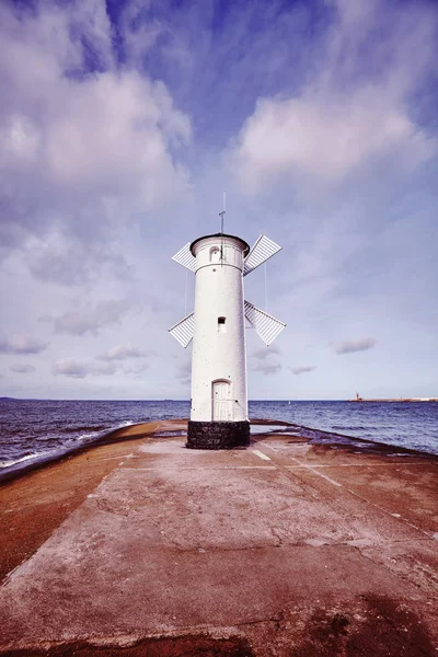 Color toned picture of old lighthouse in Swinoujscie, Poland — Stock Photo, Image