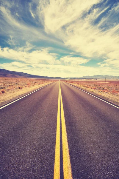 Vintage toned desert road, Death Valley, USA. — Stock Photo, Image