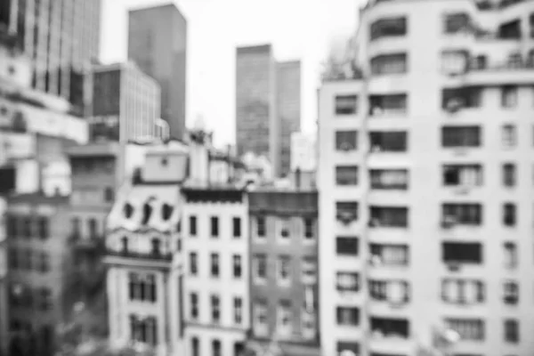 Blurred black and white photo of Manhattan buildings, NYC. — Stock Photo, Image