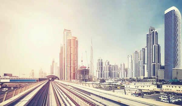 Color toned panoramic picture of Dubai skyline, UAE. — Stock Photo, Image