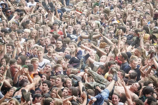 People having fun at a concert during the 23rd Woodstock Festival Poland. — Stock Photo, Image