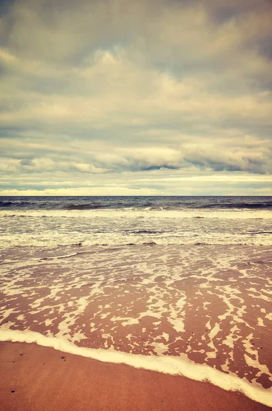 Gestemde kleurenfoto van een strand — Stockfoto