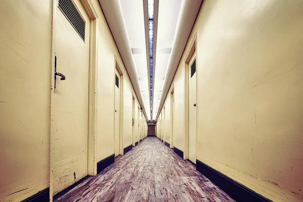 Empty corridor in an old building, color toned picture — Stock Photo, Image