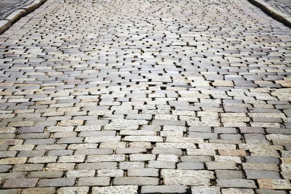 Cobblestone street pavement, urban background — Stock Photo, Image