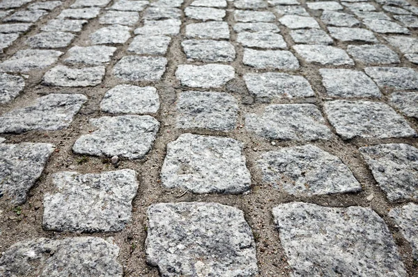 Close up picture of an old cobblestone street. — Stock Photo, Image