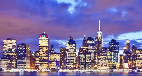Wazig kleur gestemde Manhattan skyline in de nacht, New York. — Stockfoto