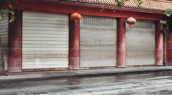 Empty Street Closed Shops Red Columns Lanterns Color Toning Applied — Stock Photo, Image