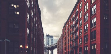 Dumbo and Manhattan Bridge, retro toned picture, New York City, USA. clipart