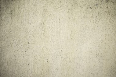 Beton duvarın dokusu yaşlanma izleri ile beyazlatıcı ile kaplıydı..