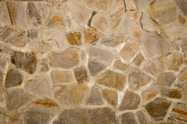 Duvarcılık duvarının dokusu beton üzerine büyük taşlar. İnşaat, mimari.