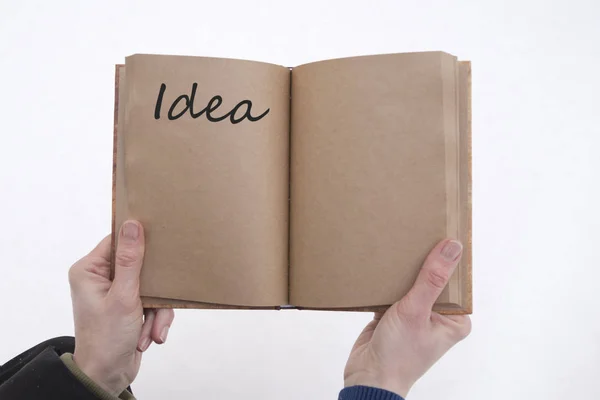 Idea Scritta Libro Nelle Mani Uomo Uno Sfondo Neve — Foto Stock