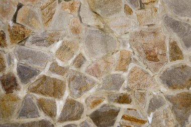 Granit kayalardan oluşan duvarın dokusu. Yapı, mimari.